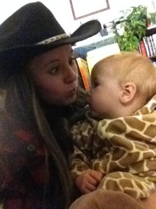 giraffe and cowgirl