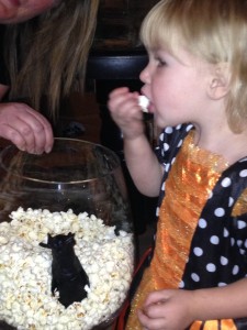 Sarah doesn't mind sharing popcorn with this rat, but touch it?  No way!